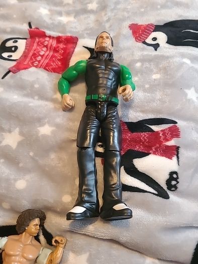 13 WWE wrestling figures