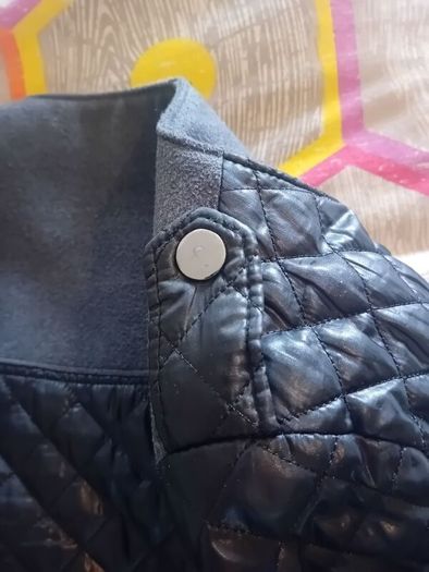 ladies jacket. Padded design. Black with grey material. Size small