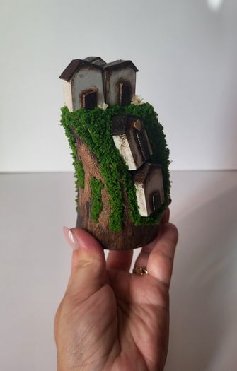 Handcrafted wooden houses on logs!