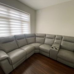Brand new leather recliner sofa for sale with usb charge ports, wireless charger and cup holders