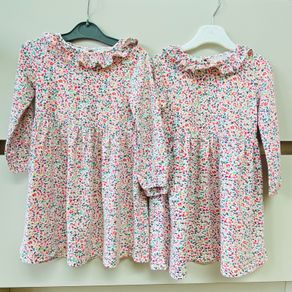 Twin long sleeved dresses