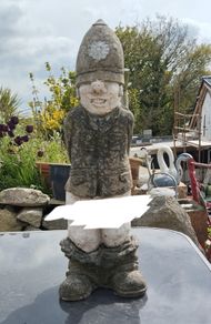 Policeman with trousers down, concrete, v heavy, D18