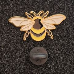 Bee ,  pin back badge.