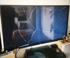 Sony 48" Smart TV with cracked screen (for parts/repair)