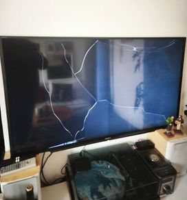Sony 48" Smart TV with cracked screen (for parts/repair)