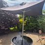 Garden table and parasol Image 2