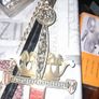 A Ceremonial Sword with Crown Gilt Metal Hilt with Coloured Stones, Etched Steel Blade and Black Scabbard with Gilt Mounts and Suspension Chain.  Postage Available on all my Items or Collection Stage or Movie Props Image 10