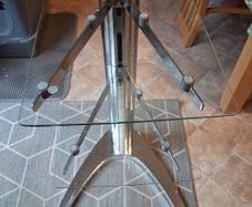 glass and chrome stand