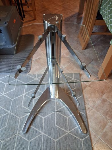 glass and chrome stand