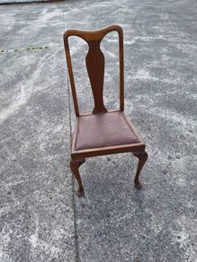Vintage chair with brown leather seat