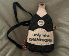 Skinny Dip champagne bag