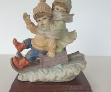 Children on slay sculpture on plinth ceramic vintage