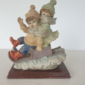 Children on slay sculpture on plinth ceramic vintage