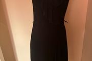 Black elastic knee-length V-Neck Wrapt dress size UK10 EU38 Postage included