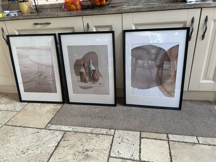 large black frames and prints x3