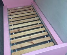 Two pink Ikea beds