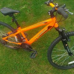 junior mountain bike with 24-inch wheels.