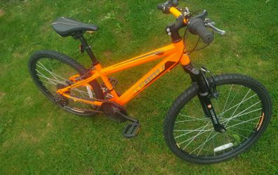 junior mountain bike with 24-inch wheels.