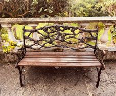 Cast iron garden bench and chair