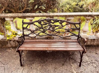 Cast iron garden bench and chair