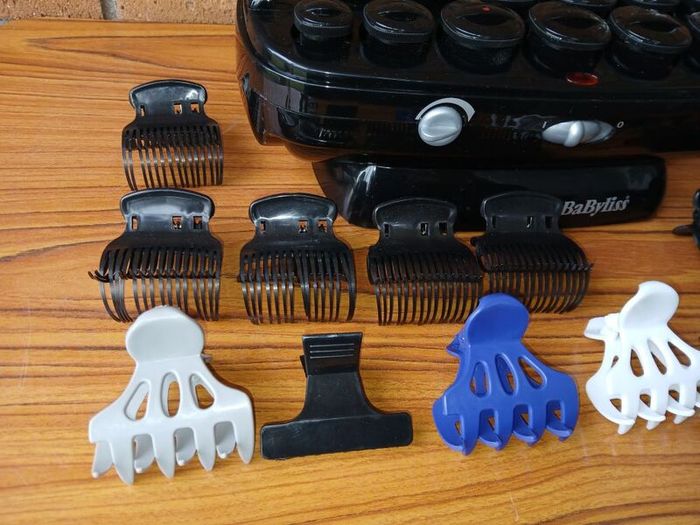 New BaByliss heated hair roller kit including rollers and clips.