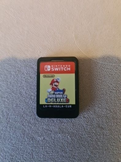 Nintendo Switch Plus 4 Games and Case.
