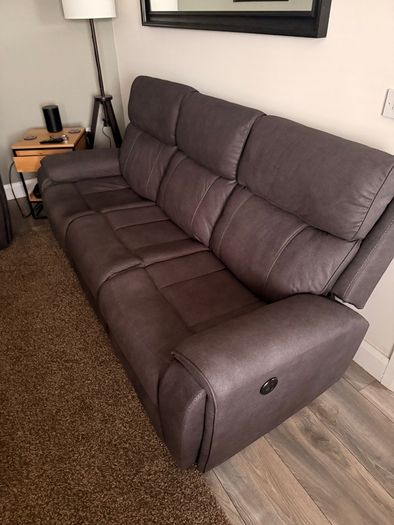 Three-seater electric reclining sofa