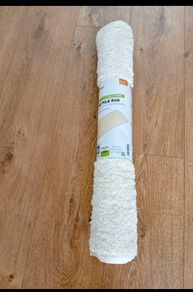 2 Brand New Cream  Long Pile rugs for sale if both together reduced to 40 euro for both