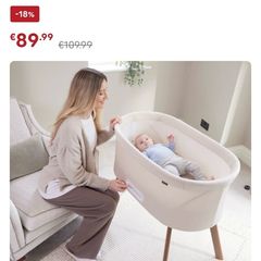 Nested motion electric bedside crib