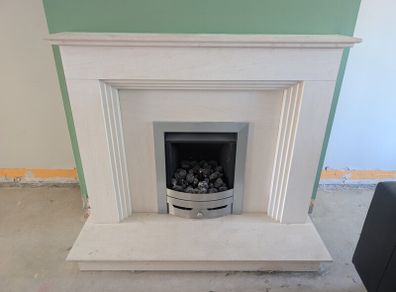Portuguese limestone fireplace and gas fire