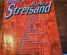 The Best Of Barbra Streisand Music Book With Piano-vocals-guitar. Large Volume Paperback In Good Condition.  See Photos For Same.