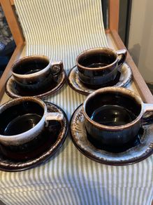 Vintage American studio pottery cups and saucers.