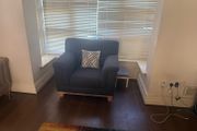 Large navy armchair