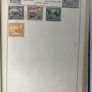 Collections: Green album from I suspect circa 1950's with used stamps from around the world. I have take picture of the 20odd pages and they go from sparse contents to complete. Image 10
