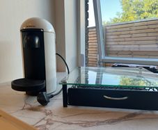Nespresso Vertuo Plus Coffee Pod Machine with pod storage