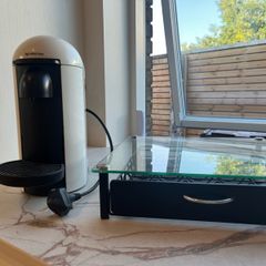 Nespresso Vertuo Plus Coffee Pod Machine with pod storage