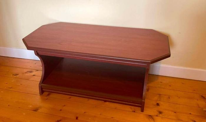 Elegant Dark Wood Coffee Table with Handy Storage Shelf