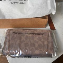Brand New Coach zip around wallet in signature print