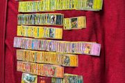 Pokemon large Sized Storage Tin and 250 cards and 2 v/ex cards
