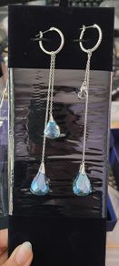 Swarovski Asymmetrical Drop Hoop Earrings in blue and clear