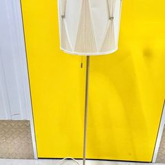 Polished steel pull cord floor lamp. Whit & beige shade.