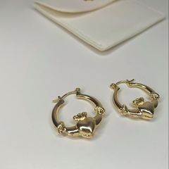 Gold tone claddagh earrings