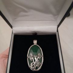 Sterling silver pendant with stone