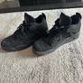 Black Cat Jordan 4s Image 3