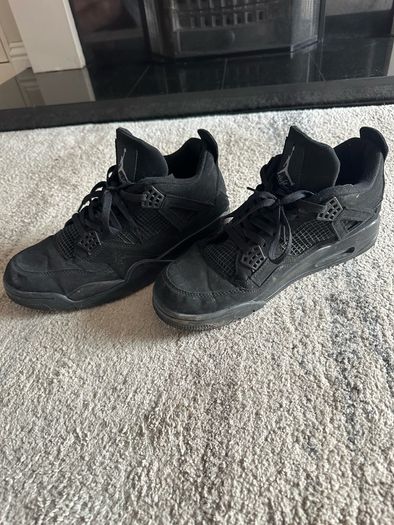 Black Cat Jordan 4s