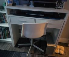 desk , office chair and book shelf