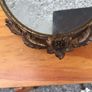 Brass framed ornate oval mirror Image 2
