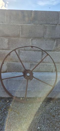 old wrought iron wheel.