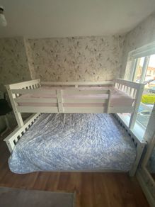 Wooden triple bunk bed