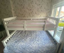 Wooden triple bunk bed